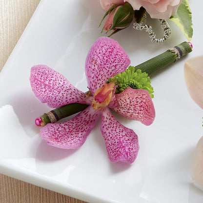 Pink Mokara Boutonniere –  Newell Flower Shop Ltd., Kamloops BC