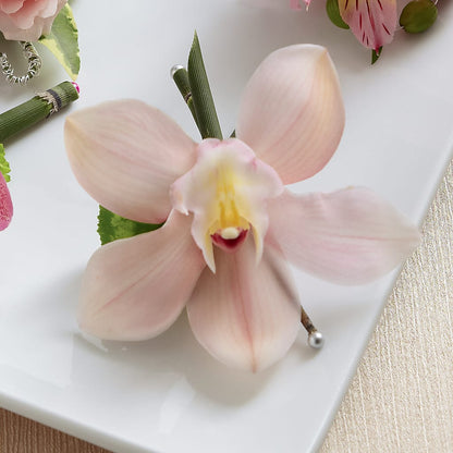 Pink Cymbidium Boutonniere –  Newell Flower Shop Ltd., Kamloops BC